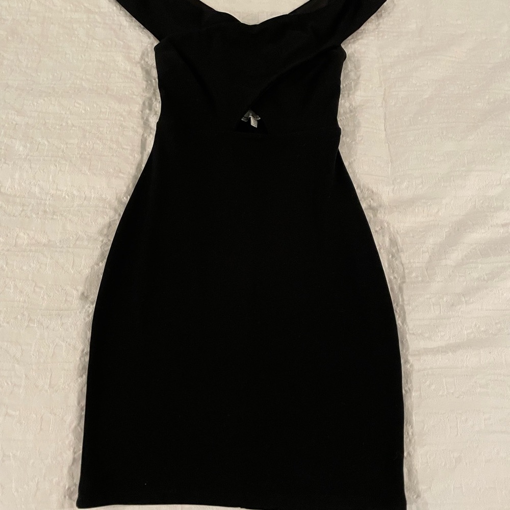 Black stretchy pencil dress with off the shoulder straps.